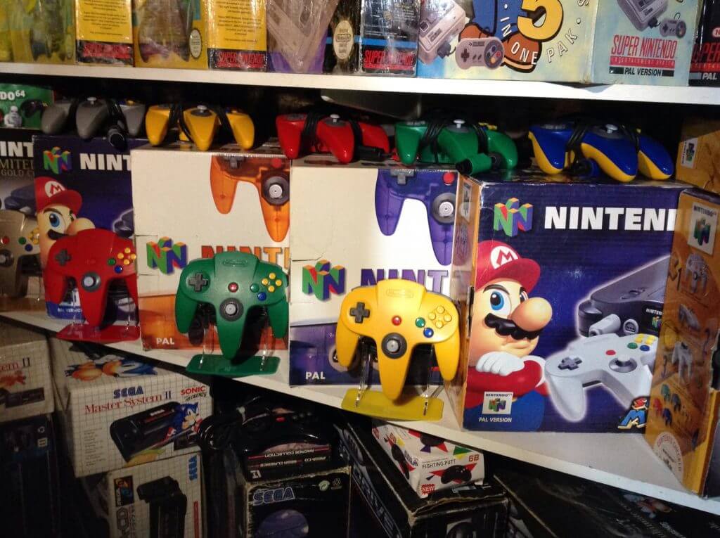 Customers N64 Retro Collection of Controller and Consoles with Gaming Displays Controller Stands